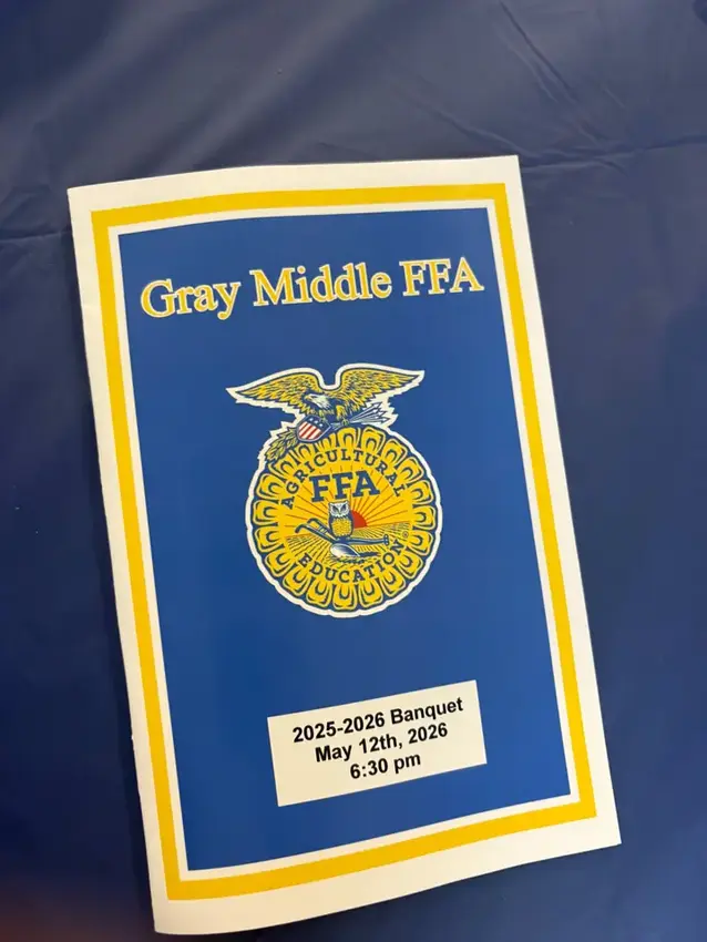 Gray Middle FFA banquet program with the FFA emblem